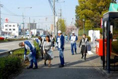 Sansen Co., Ltd. employees at a Sawayaka Drive cleanup activity